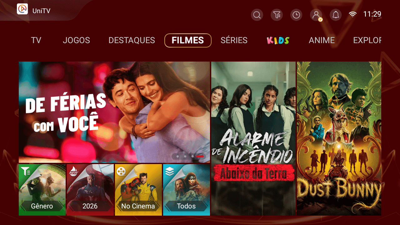 Tela de filmes do app UniTV: um destaque grande, pôsteres ao lado e atalhos para gênero, ano, em cartaz e todos.